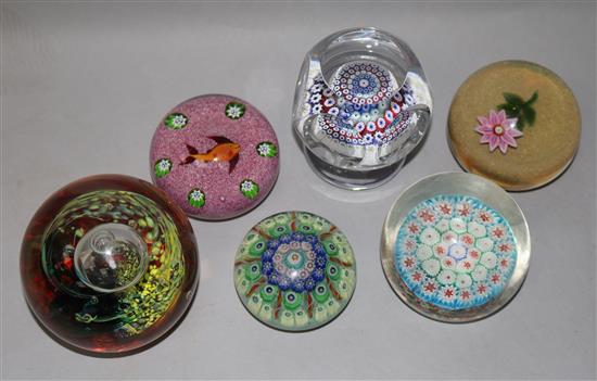 Six glass paperweights